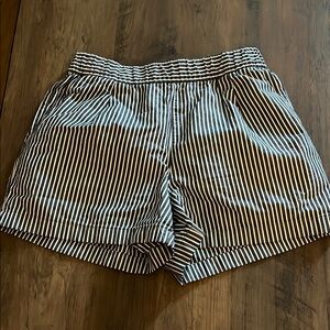 Uniqlo Black and White Bermuda Shorts with Timeless Elegance